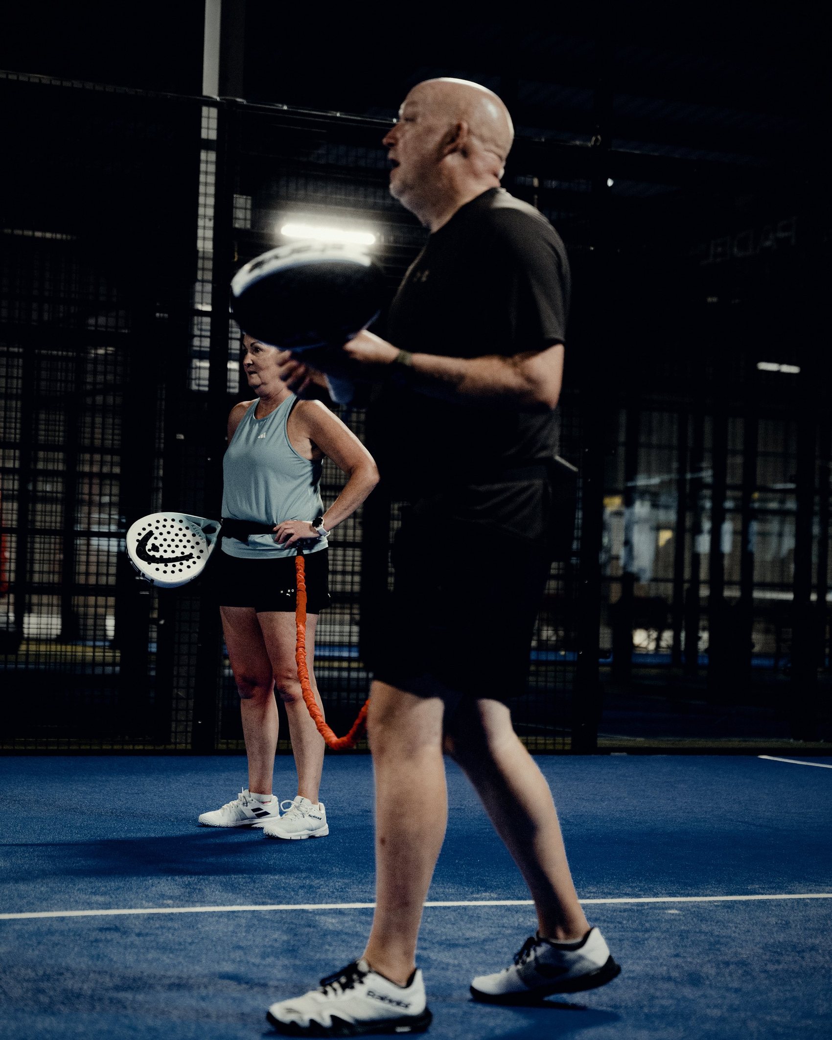 Player in action on a Cupra-branded court